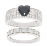 Heart-shaped black moissanite sterling silver ring with shimmering accents, luxurious and elegant design.